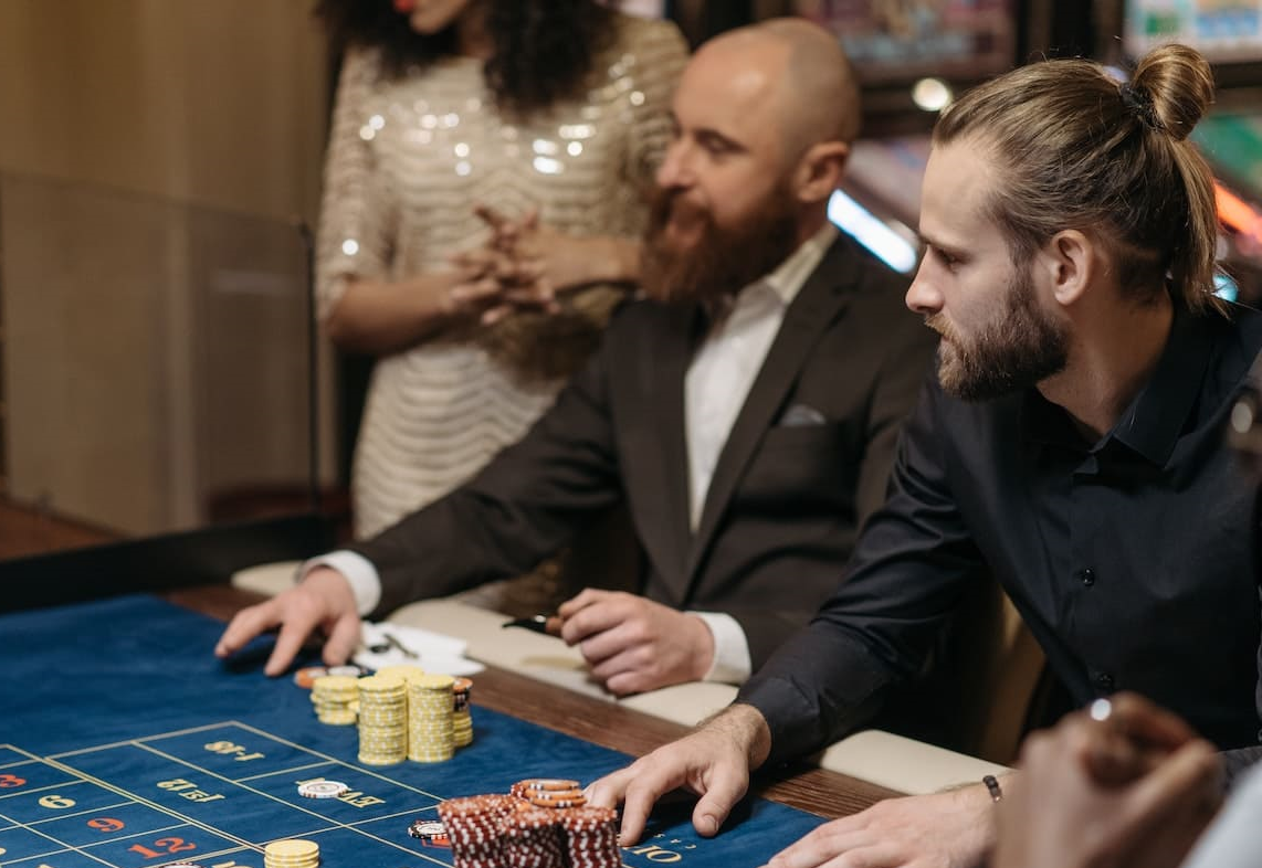 two men in casino icon